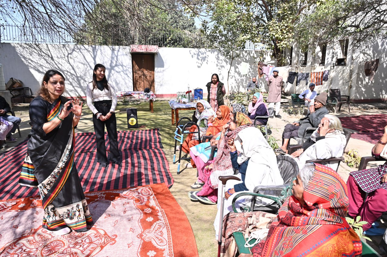 Corporate volunteer programs by VridhCare showing employees supporting elder care and companionship at old age homes in India.